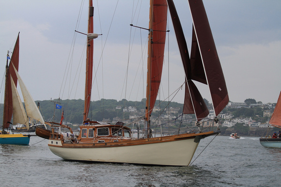 The Brixham Heritage Regatta Fleet sailing in no wind