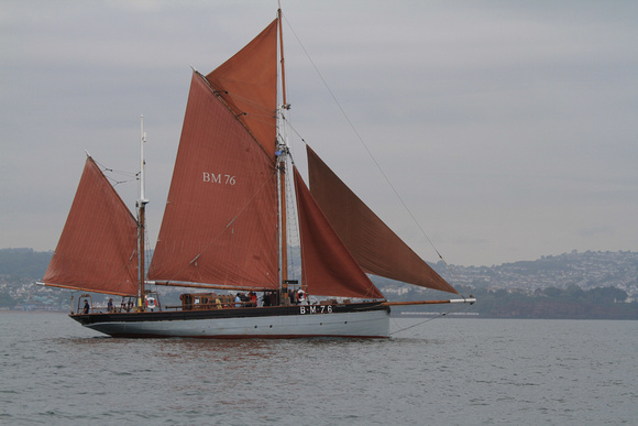 The Brixham Heritage Regatta Fleet sailing in no wind