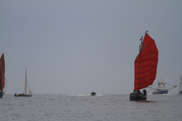 The Brixham Heritage Regatta Fleet sailing in no wind