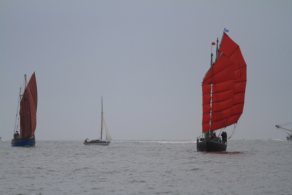 The Brixham Heritage Regatta Fleet sailing in no wind